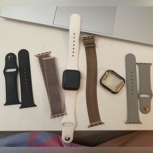 Gold series 4 Apple Watch with 5 bands and charger